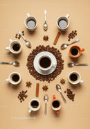 Arrangement of Coffee Cups with Beans and Spices on Table