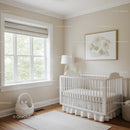 Bright Baby Nursery with White Crib and Natural Light
