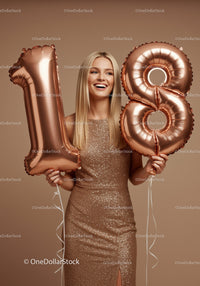 Smiling young woman celebrating eighteenth birthday party