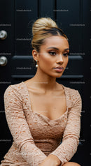 Elegant woman with lace dress posing by black door