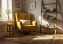 Cozy reading nook with yellow armchair and natural light