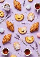 Assorted French Pastries with Lavender and Tea on Purple