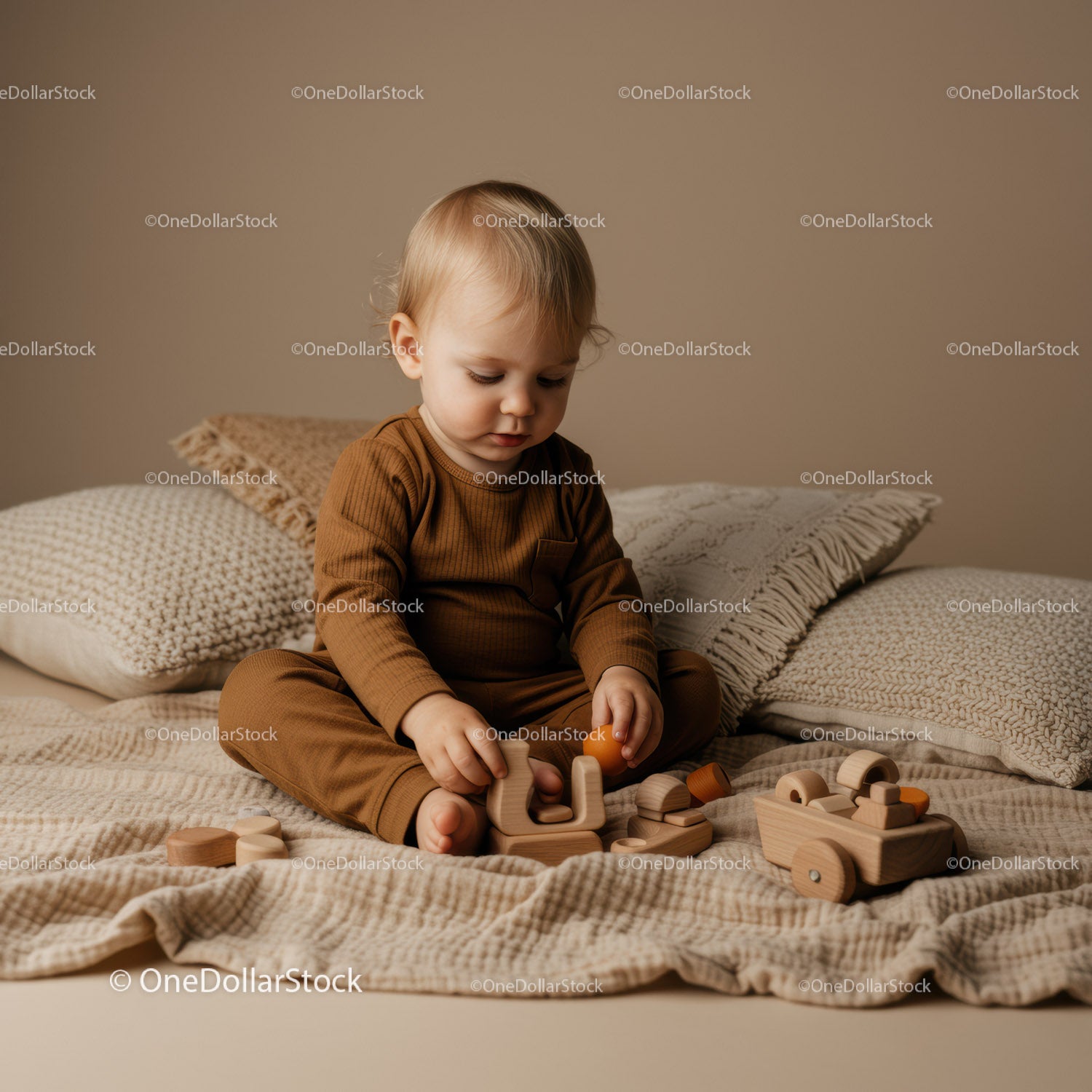 Toddler Playing with Wooden Toys on Cozy Bed