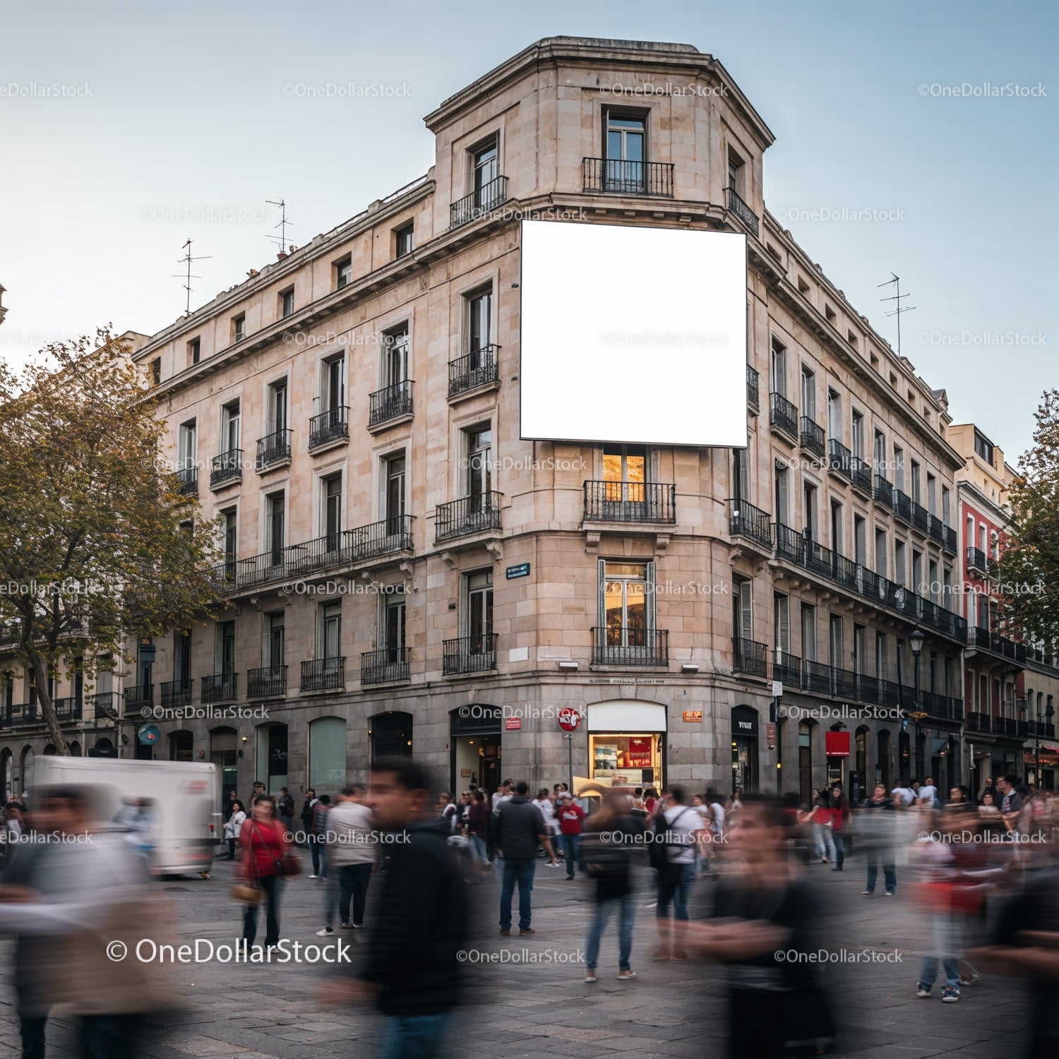 Crowded urban street corner with historic building facade