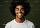 Smiling Young Man with Curly Hair in Casual T-Shirt