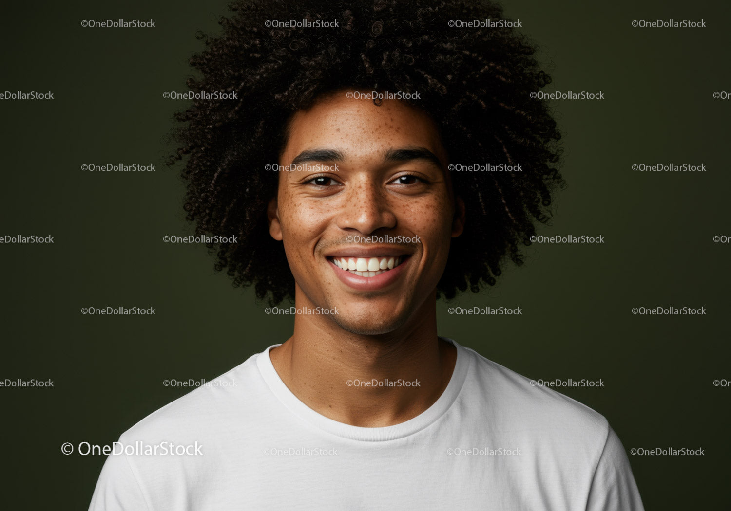 Smiling Young Man with Curly Hair in Casual T-Shirt