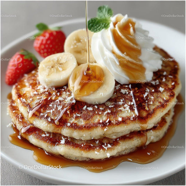 Stack of Fluffy Pancakes with Banana Strawberries Whipped Cream and Caramel