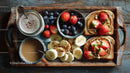 Healthy Breakfast Tray with Nut Butter Banana Strawberries and Blueberries