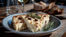Blue Cheese and Rustic Bread on Decorative Plate in Food Setting