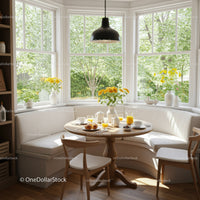 Cozy breakfast nook with natural light and flowers