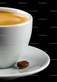 Close Up of Espresso Cup with Coffee Bean on Saucer