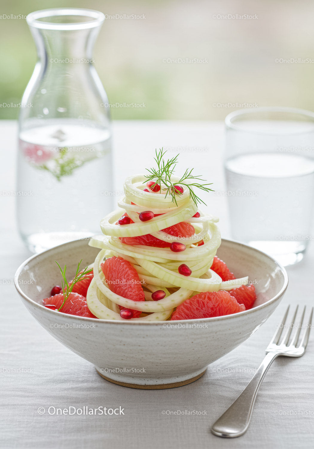 Fresh fennel and grapefruit salad with pomegranate seeds
