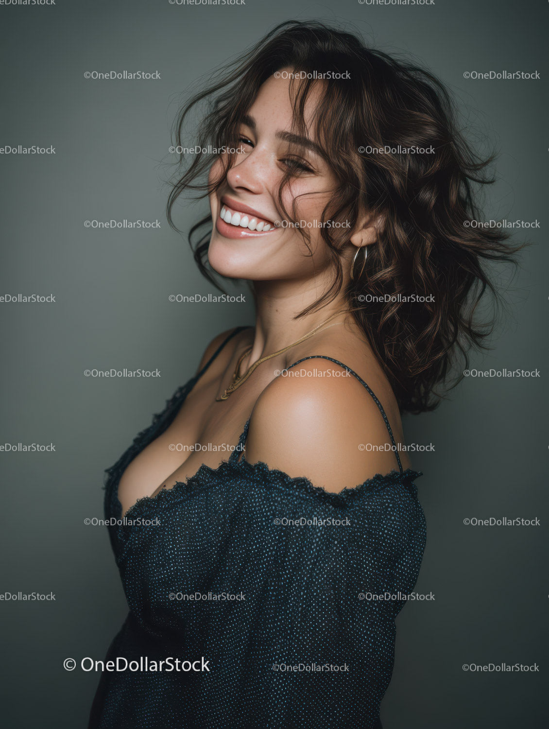Smiling Woman with Curly Hair Wearing Black Sparkly Dress