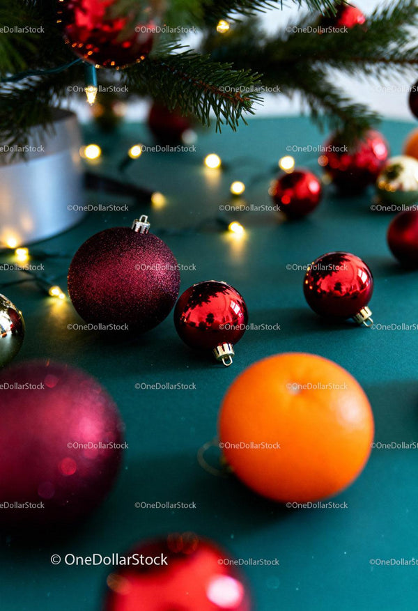 Christmas ornaments and decorations on teal surface