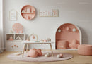 Charming Pastel Pink and White Kids Room with Playful Decor