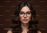Elegant Woman Wearing Glasses with Long Wavy Hair Portrait