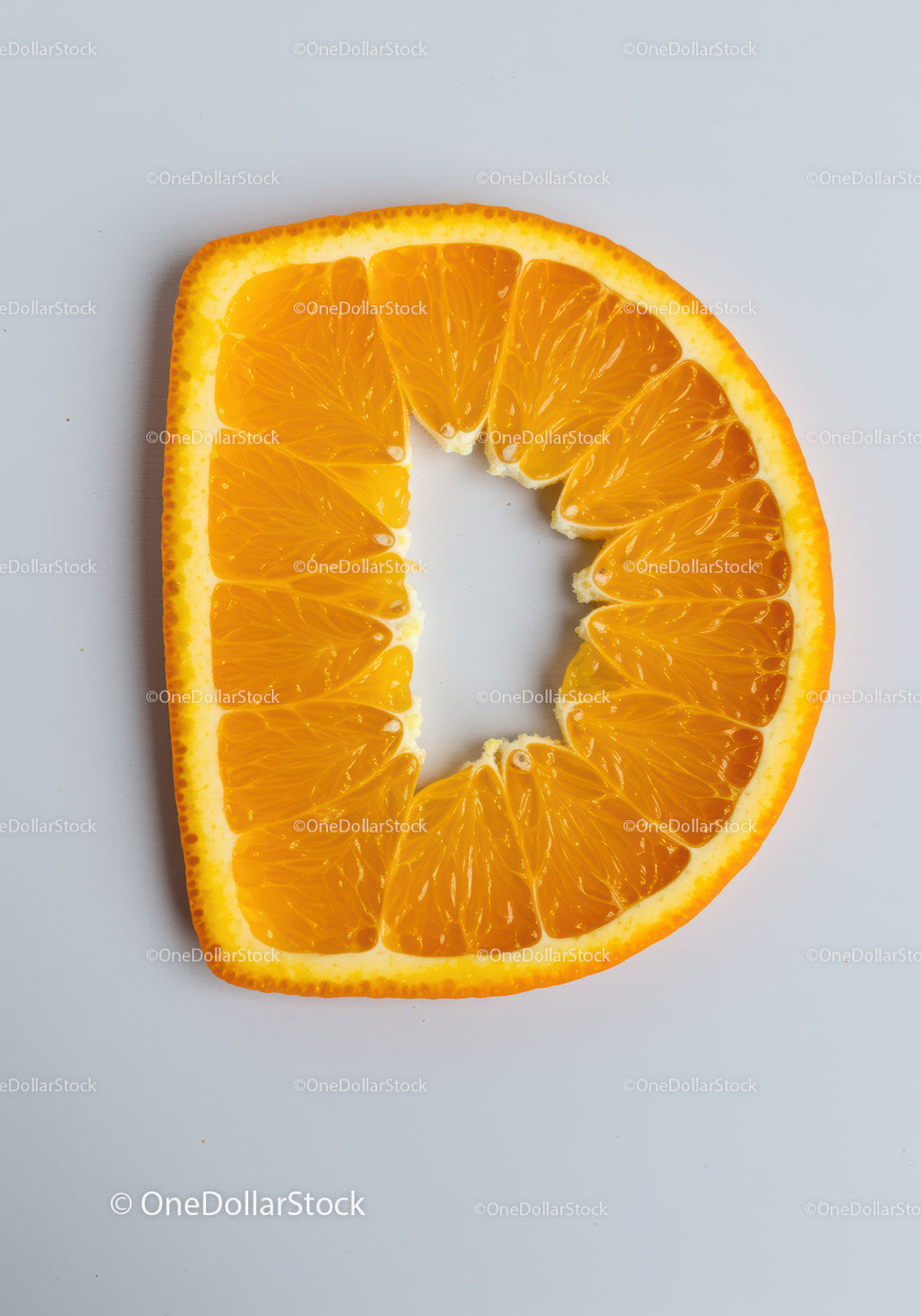 Close-up of Orange Slice with Star-Shaped Center Cutout