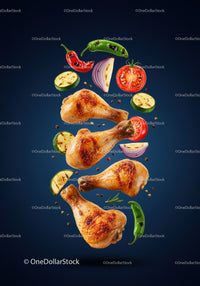 Grilled chicken drumsticks with fresh vegetables floating