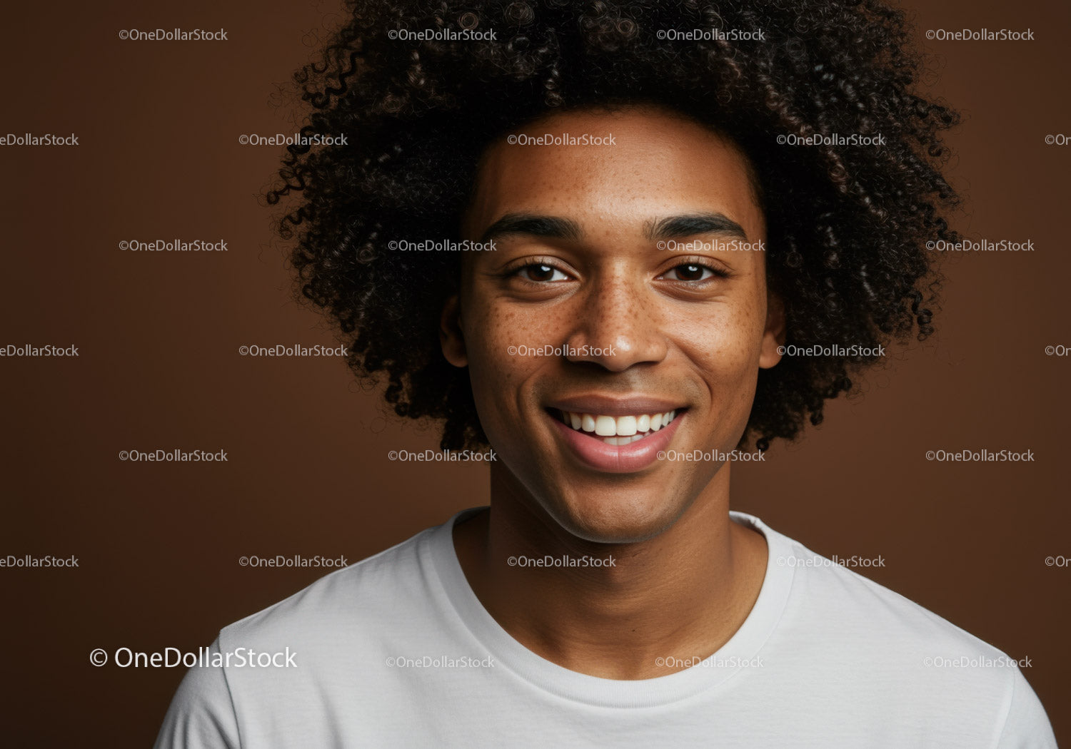 Youthful Smiling Man with Curly Hair in Portrait for Happy Lifestyle