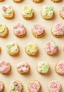 Delicate pastel mini cakes decorated with buttercream roses