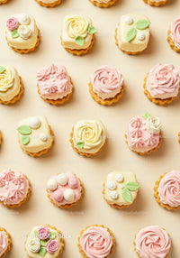 Delicate pastel mini cakes decorated with buttercream roses