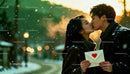 Couple sharing a romantic kiss outdoors in winter