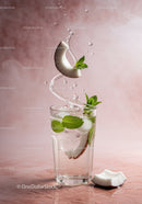 Refreshing Coconut Mint Drink with Ice in Glass