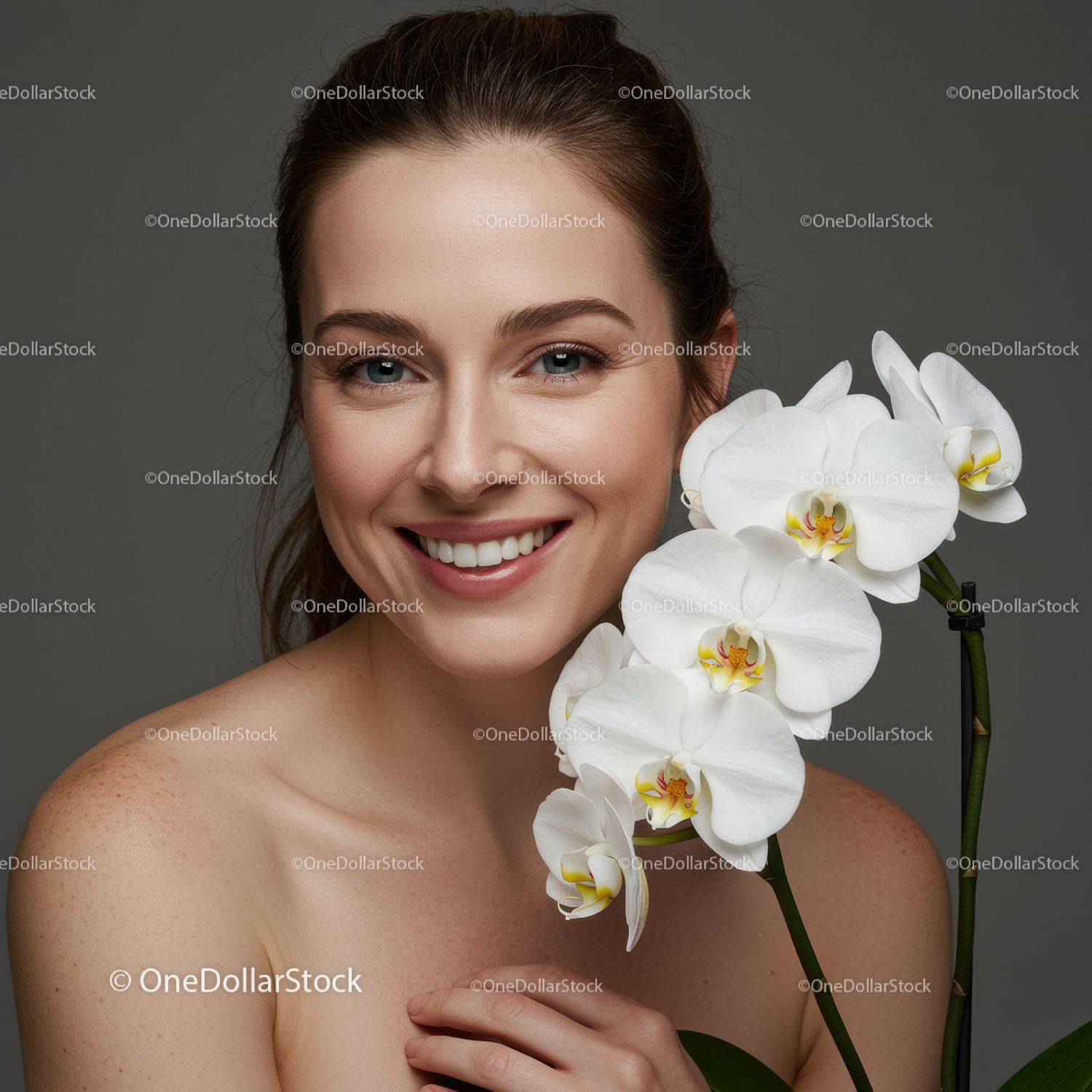 Joyful Woman with White Orchids and Beautiful Smile