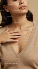 Close-up of Woman Applying Skincare Cream to Neck for Healthy Glowing Skin