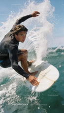 Focused Surfer Riding Powerful Ocean Wave with Skill