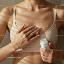 Close-Up of Woman Applying Moisturizer on Collared Skin