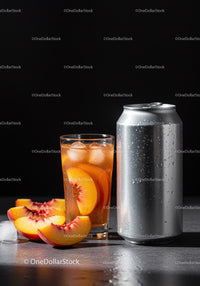 Refreshing Peach Iced Drink with Silver Can on Table