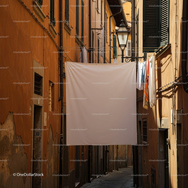 Narrow street with hanging white laundry in warm light JPG Mockup Image