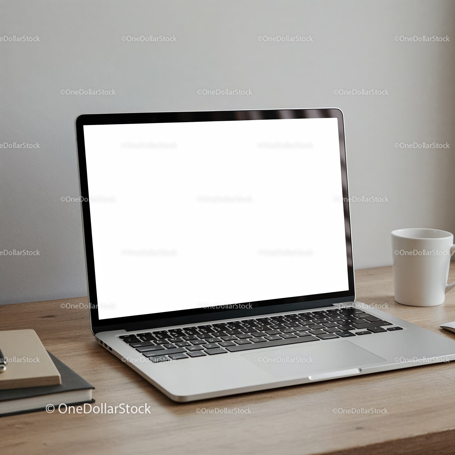 Modern laptop with blank screen and coffee cup on desk