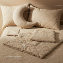 Cozy beige quilted bedding with crescent moon pillow