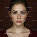 Freckled Young Woman with Bright Brown Eyes in Casual Red Sweater
