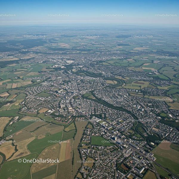 Aerial Cityscape with Roads and Green Spaces in Bright Daylight