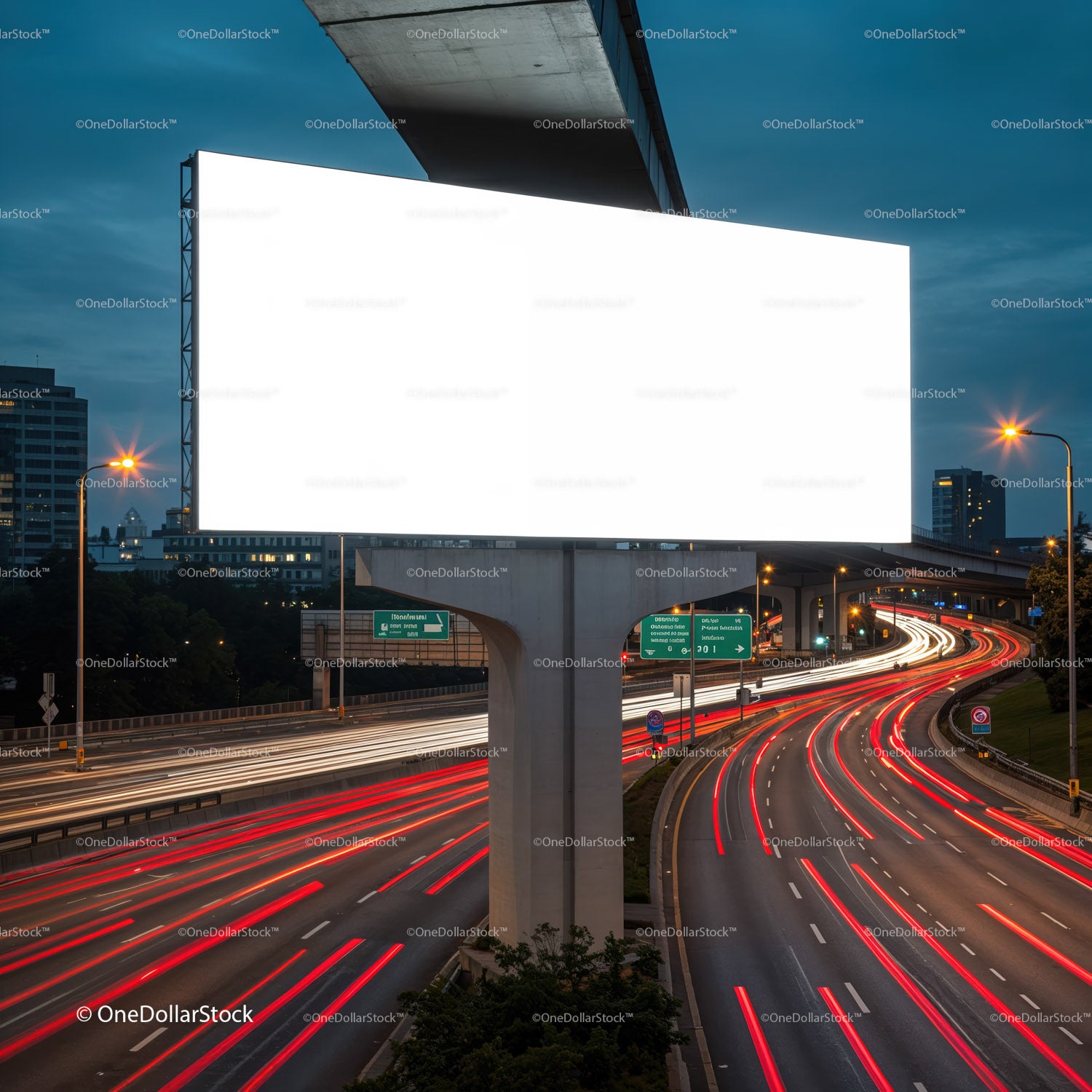 Billboard over busy highway with light trails at dusk