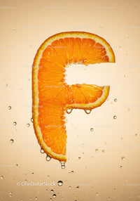 Fresh Orange Slice Shaped Like Letter F Underwater