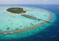 Tropical Island with Overwater Bungalows and Turquoise Seas