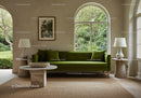 Minimalist Living Room with Green Sofa and Natural Light