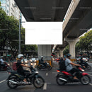 Urban Traffic with Motorcycles Passing Beneath Overpass