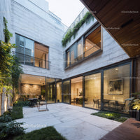 Modern Architectural Building with Glass Windows and Outdoor Patio