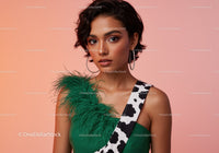 Elegant Woman with Green Feathered Accessory and Leopard Print Strap