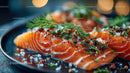 Fresh Sliced Smoked Salmon with Herbs and Sea Salt on Black Plate