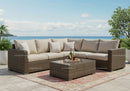 Outdoor Wicker Sofa Set with Beach View and Cozy Cushions