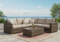 Outdoor Wicker Sofa Set with Beach View and Cozy Cushions
