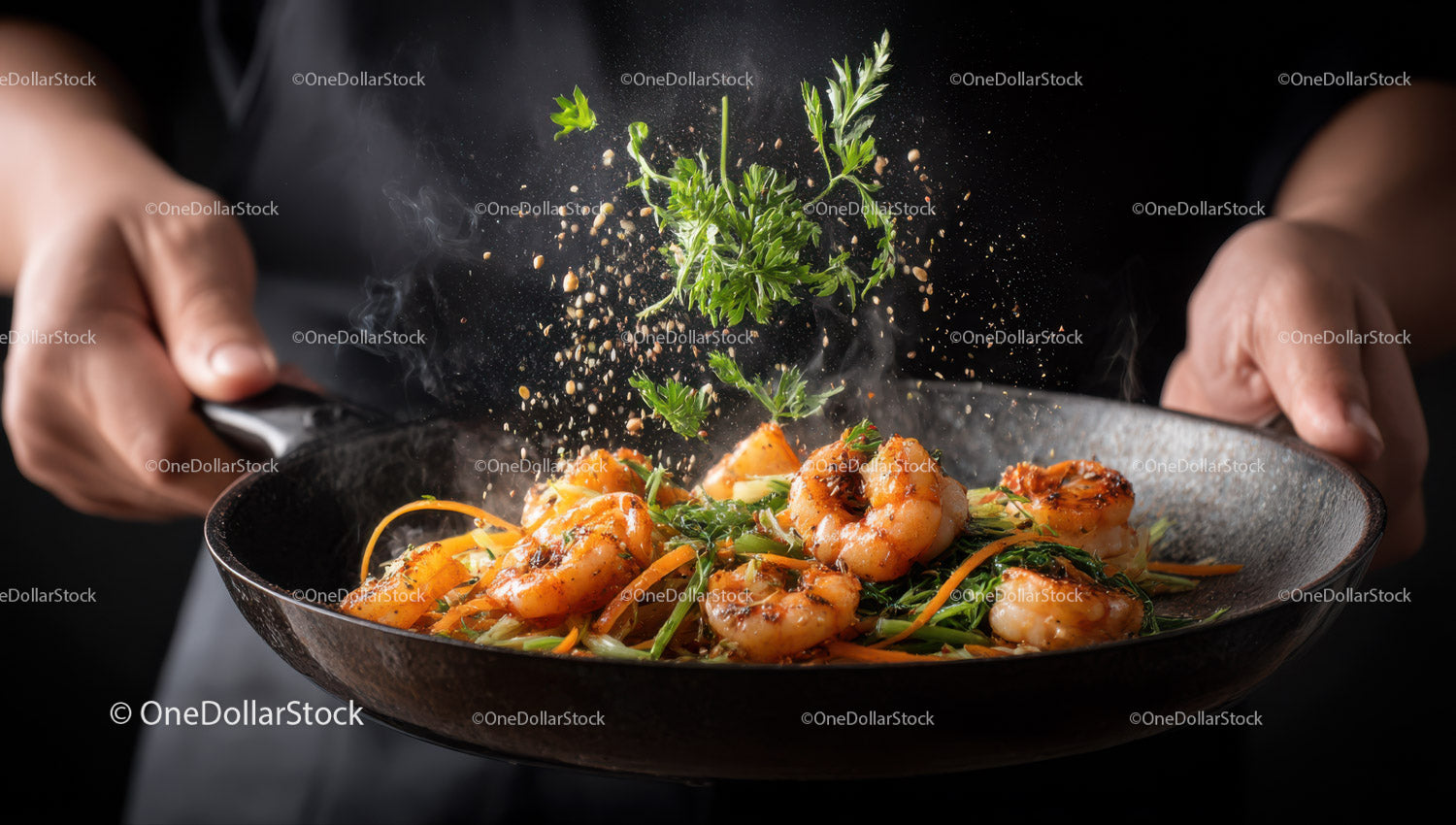 Shrimp Stir Fry with Fresh Herbs in a Black Pan