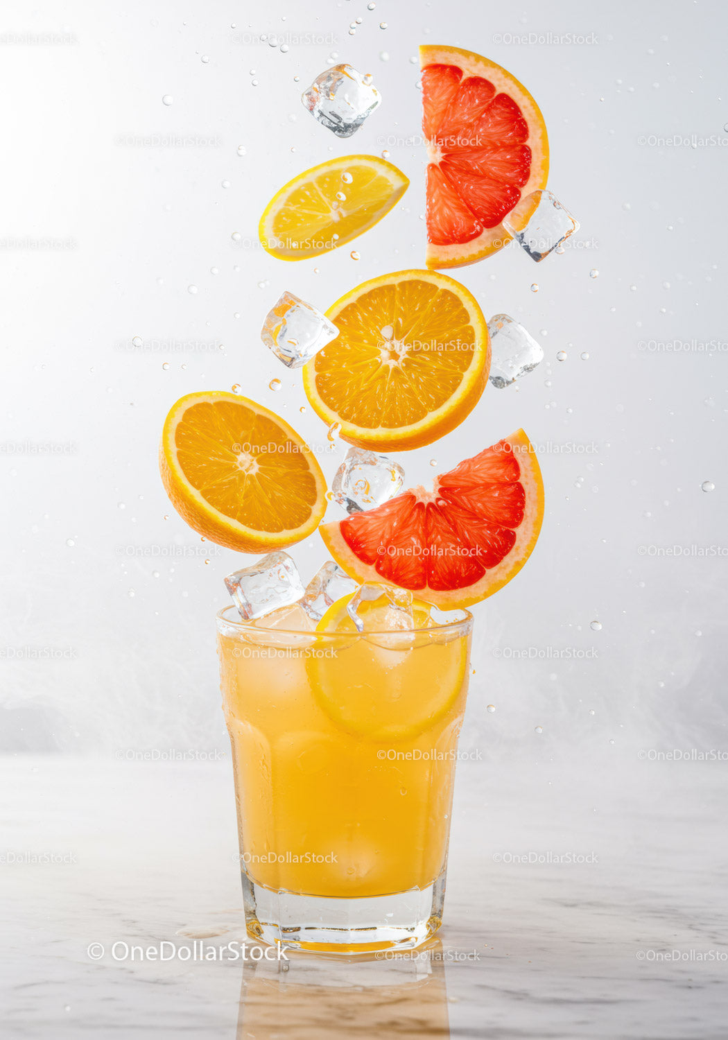 Refreshing Citrus Splash with Ice Cubes in Glass