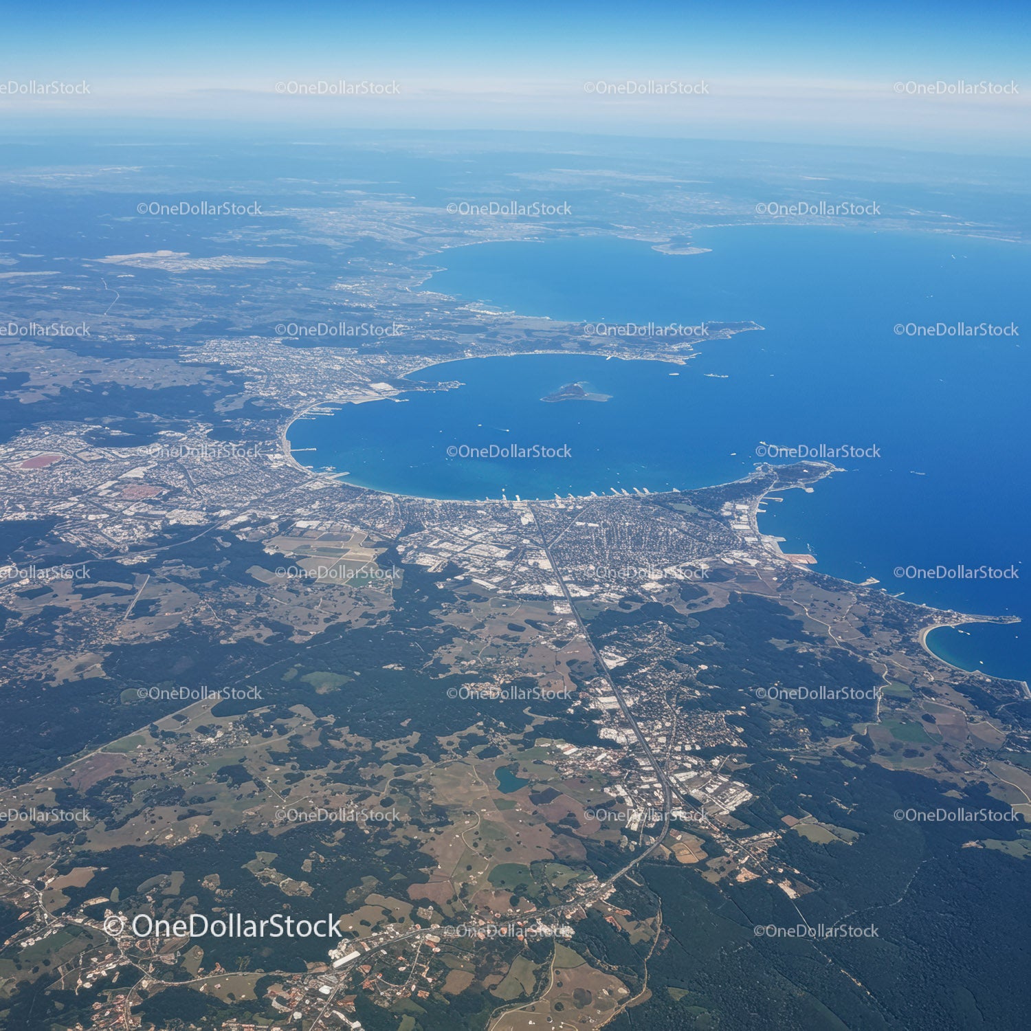 Aerial View of Lake and Surrounding Urban Landscape